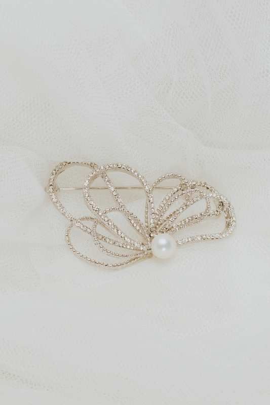 Broche mantilla rodillo